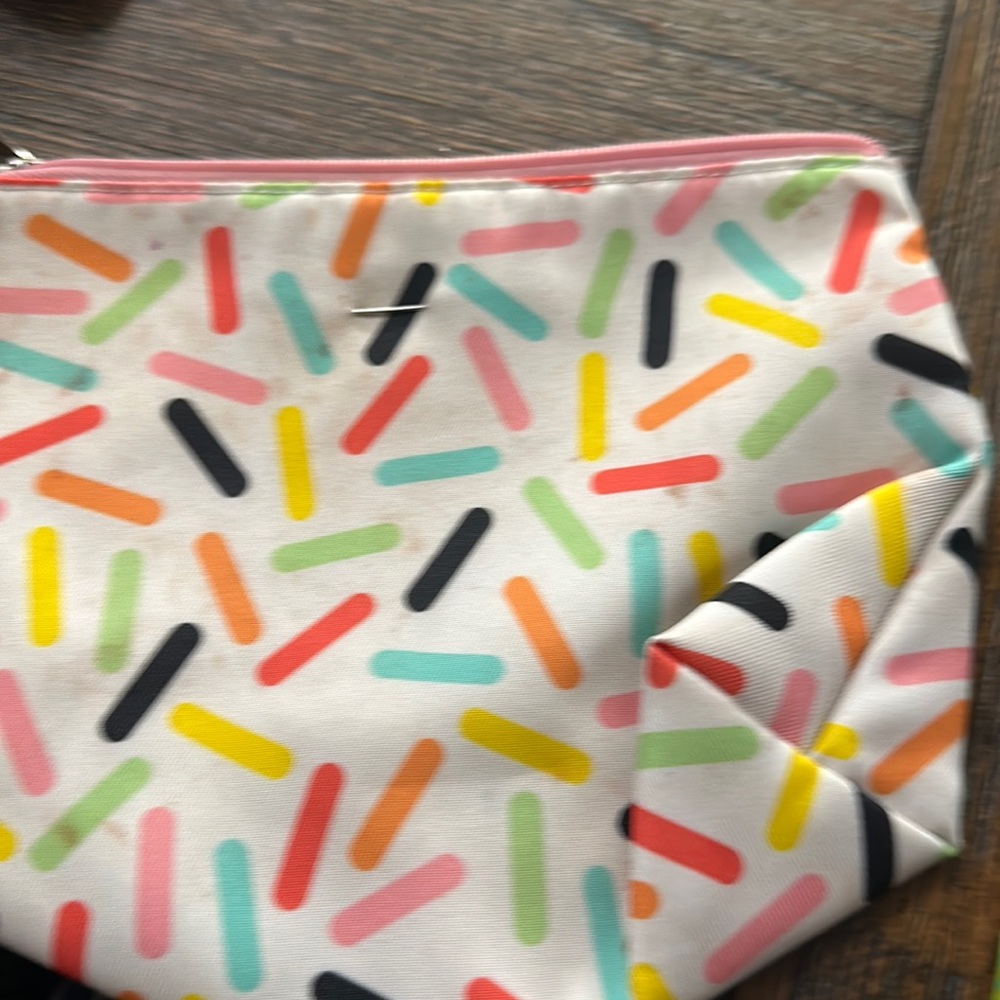 Colorful Clinique cosmetic bag